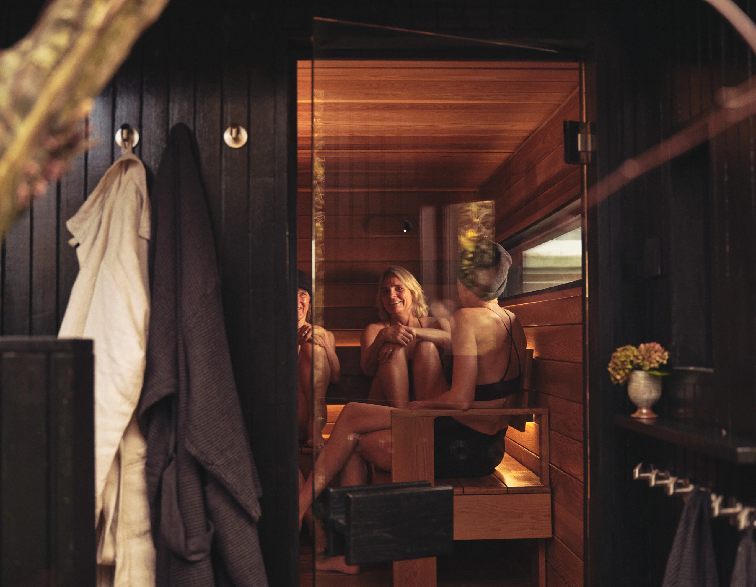 Luxury outdoor saune with people relaxing